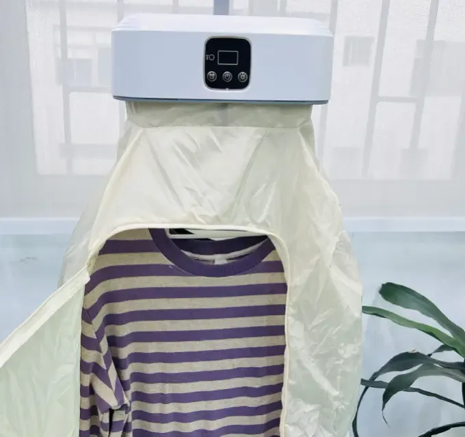 Customer photo shared by Martha: a striped shirt drying inside the AirdrobeX cover