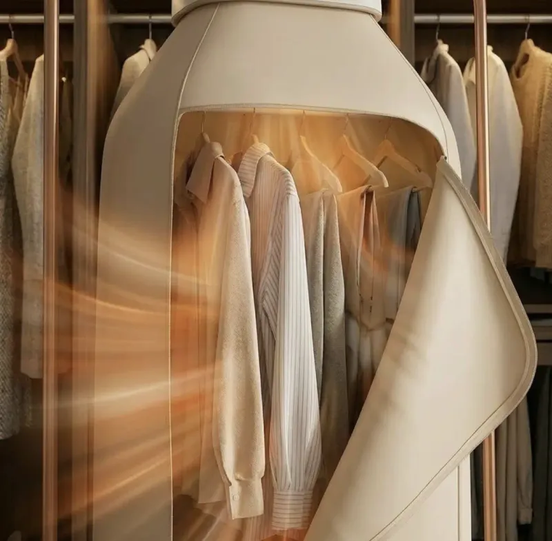 Warm air flowing through clothes inside the Qinux AirdrobeX drying cover